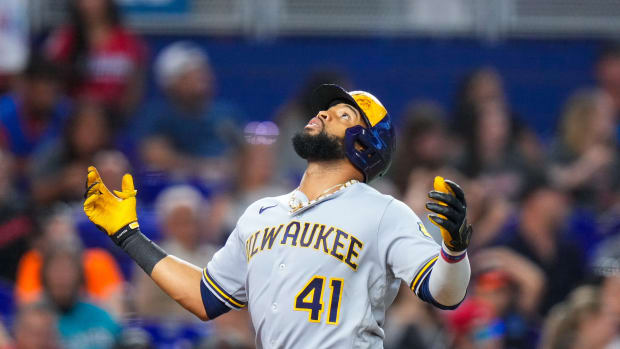 Sep 23, 2023; Miami, Florida, USA; Milwaukee Brewers first baseman Carlos Santana (41) celebrates hitting a three run home run against the Miami Marlins during the sixth inning at loanDepot Park.